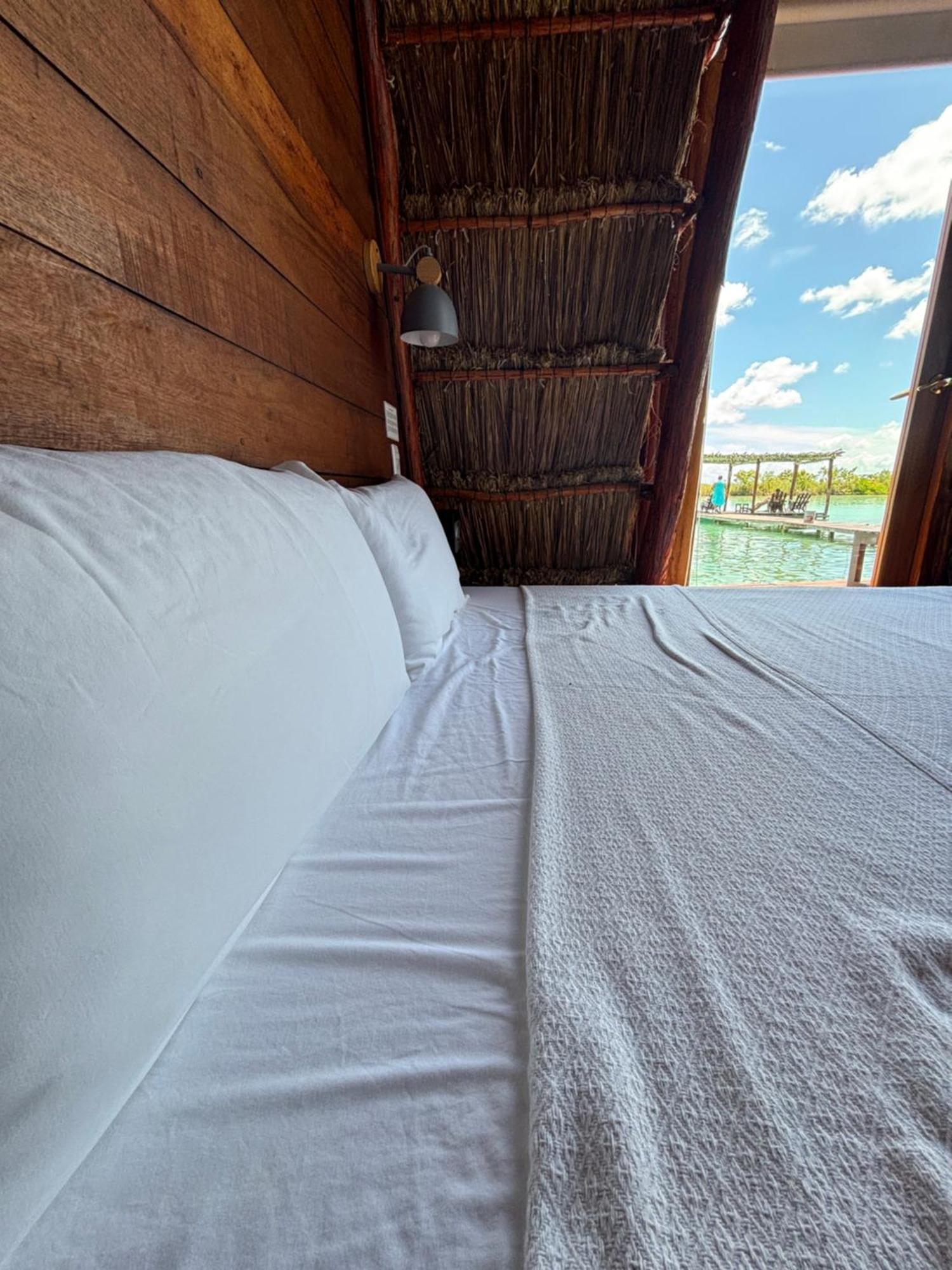 Hotel Casabakal - A Pie De Laguna - Bacalar Exterior photo A bed with a sheet